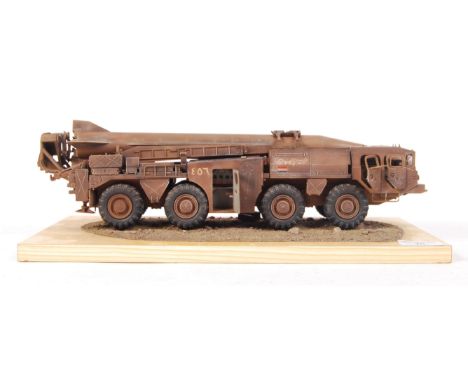 A superb museum quality military model diorama. Showing an armoured military launcher truck. The model being superbly detaile