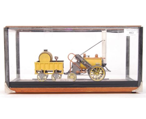 A beautiful scale model of ' Stephenson's Rocket ' railway locomotive. Highly detailed, and presumably made of plastic. Mount