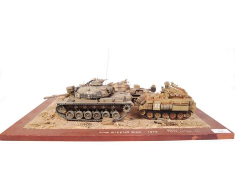 A superb museum quality military model diorama. Showing 3x tanks and several soldiers, titled ' Yom Kippur War 1973 ' . The m