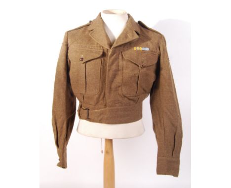 An original scarce post-WWII Second World War 7th Armoured Division ( Desert Rat ) uniform tunic. 1949 Pattern, Size 8. With 