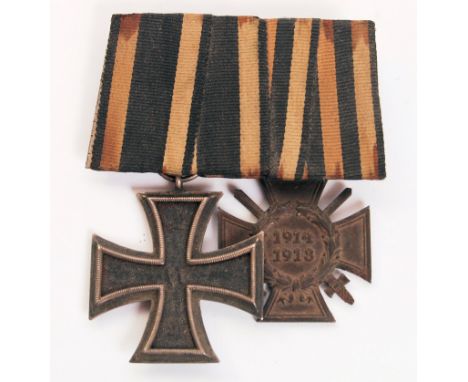 A WWI First World War German medal group comprising a 2nd Class Iron Cross with 1813 to one side and 1914 to the other (the l