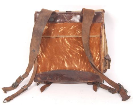 An original WWI First World War German soldier's uniform Tornister ( back pack ). The rear leather strapping stamped for ' In