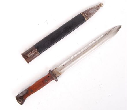 A WWI First World War German S84/98 pattern rifle bayonet. The ricasso stamped for Weyersberg of Solingen, 1887. With leather