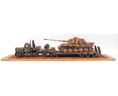 A superb museum quality military model diorama. Showing an armoured military tank carrier , titled ' Moving Museum Tiger In T