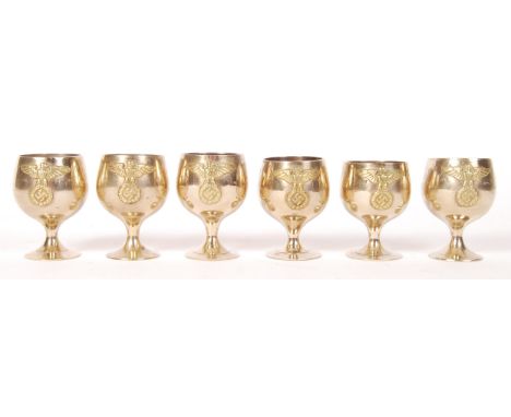 A set of 6x 20th Century WWII Second World War German Third Reich Nazi related drinking / cognac glasses. The white metal mac