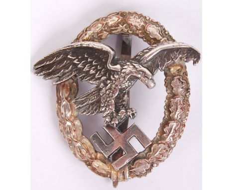 An original WWII Second World War German Third Reich Luftwaffe ' Observer Badge ' medal. Central eagle motif surmounted by la