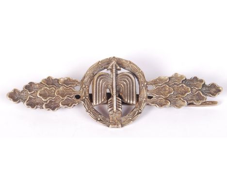 An original WWII Second World War German Third Reich Luftwaffe ' Night Fighter Clasp ' medal. Central arrow motif surmounted 