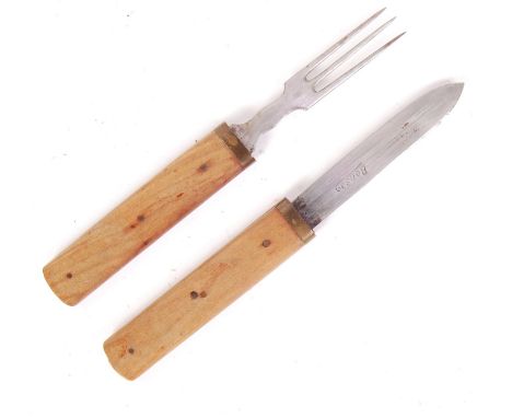 An original WWI First World War campaign cutlery set / field officer's concealed knife and fork. Each utensil having wooden h