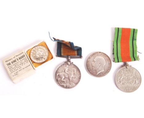 A collection of WWI First World War &amp; WWII Second World War medals, comprising: a WWI War Medal for 1028 Gunner L. Jones 