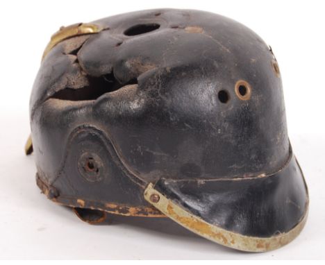 An original WWI First World War German / Prussian infantry Pickelhaube helmet. The leather skull with impressed marks ' 12.C.