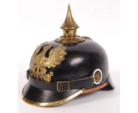 A superb part-reproduction WWI First World War Imperial German / Prussian uniform Pickelhaube helmet. Leather construction, w