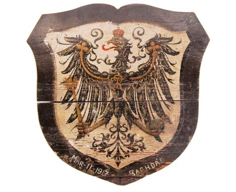 An incredibly rare WWI First World War Prussian painted wooden plaque, featuring the Prussian eagle to the front. To the lowe