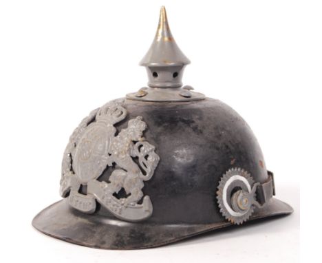 A believed original WWI First World War Imperial German / Prussian Pickelhaube uniform helmet. Steel skull, with painted bras