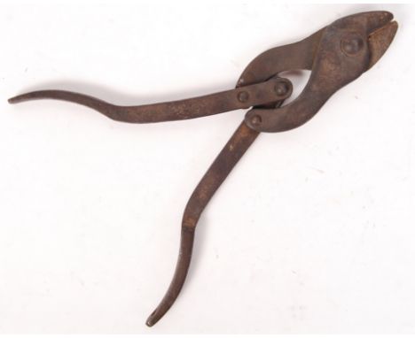 A pair of original WWI First World War likely German-issue trench barbed wire cutters. Folding, and the handle stamped ' 2 ' 