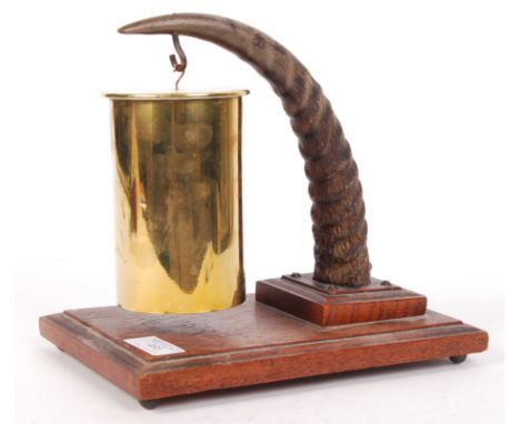 An unusual WWI First World War period gong made from the antler of a Springbok antelope and a German Franco-German War artill