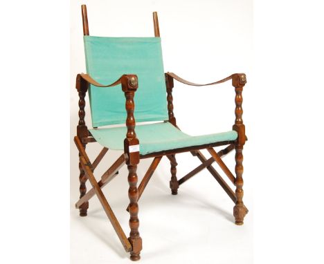 A rare late 19th / early 20th century / WWI First World War era folding campaign Officer's chair. Mahogany construction, with