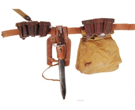 A WWI First World War German infantry soldier's uniform belt, pouches and bayonet ensemble. Comprising of a WWI S98 rifle bay