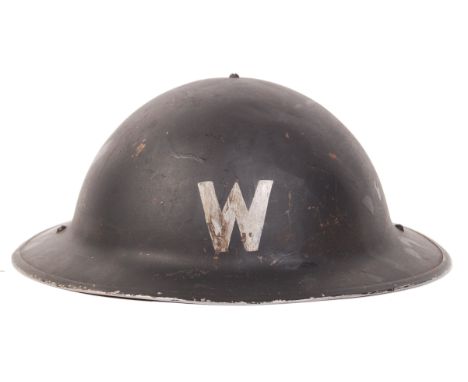 An original WWII Second World War British ARP Air Raid Precautions Warden's steel helmet, with white painted 'W' to front and