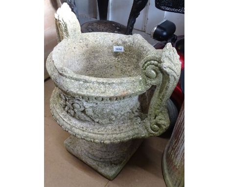 A weathered concrete 2-section garden planter on stand.