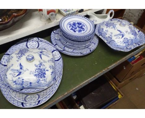 Blue and white plates, sauceboat, etc.