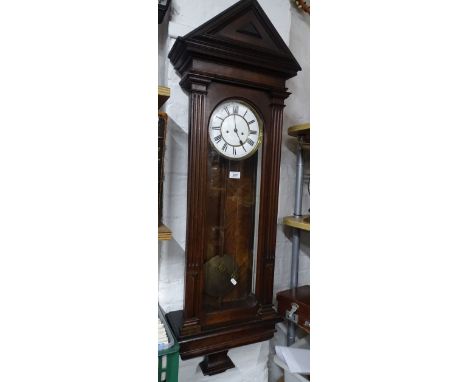 A mahogany cased Vienna regulator wall clock.