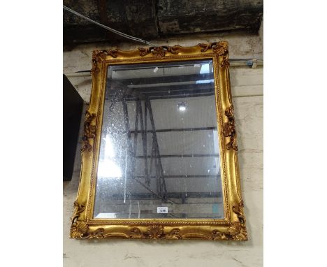 A giltwood framed rectangular bevelled edge wall mirror.