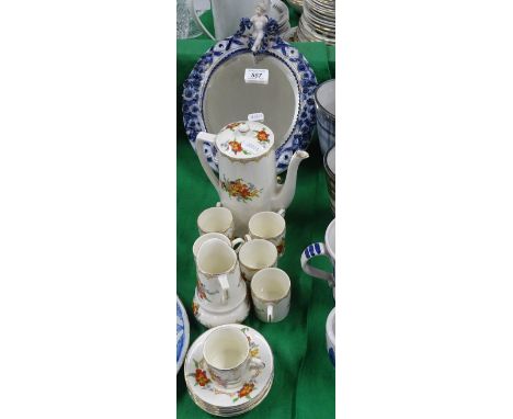 Ceramic framed mirror, and a coffee set.