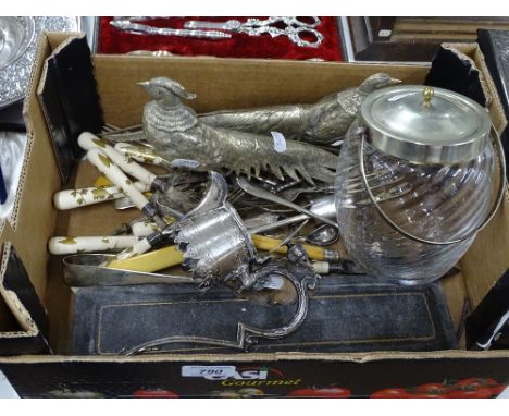 Pair of silver plated table pheasants, ice-bucket with plated mounts, a plated decanter mount, gilded ceramic handled cutlery