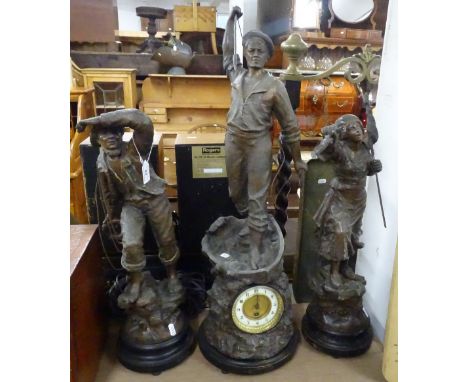 Continental patinated spelter 3-piece clock garniture.