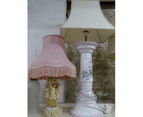 A nursery lamp and a ceramic table lamp.