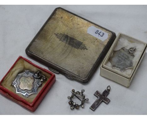 Engine turned silver cigarette box, 2 silver fobs, cross and a brooch.