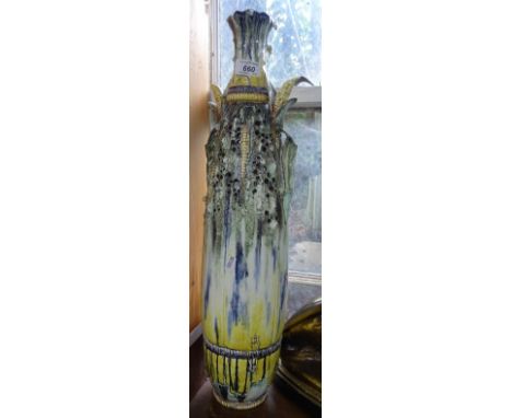 Continental pierced and painted tall ceramic vase with corn cob handles.