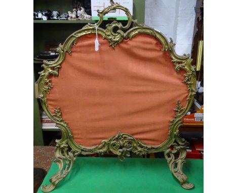 A French Rococo gilt brass firescreen.