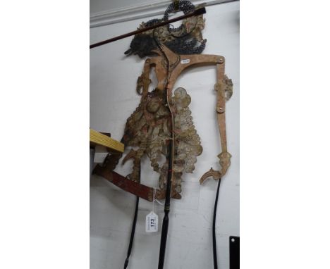 A Thai dancing figure puppet.
