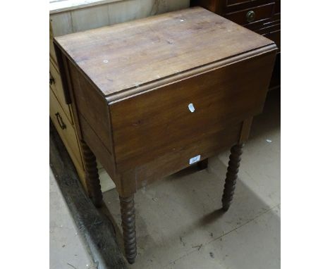 A 19th century continental mahogany drop leaf sewing table on bobbin turned legs, width 1'7".