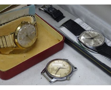 A boxed gent's Timex wristwatch, a Pinnacle wristwatch and another, (3).