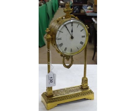 A gilt brass continental mantel clock.