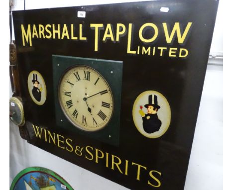 Vintage wall clock inset into a wines and spirits sign for Marshall Taplow Ltd.
