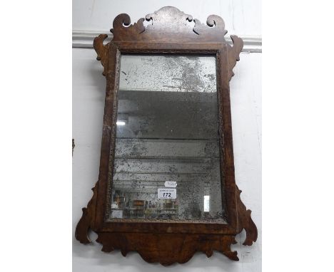A Georgian walnut framed wall mirror.