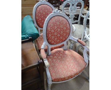 A pair of French painted salon armchairs with upholstered back and seat, fluted legs.