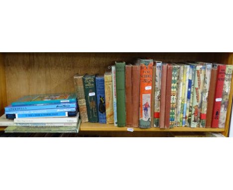 A shelf of Vintage Rupert books, etc.