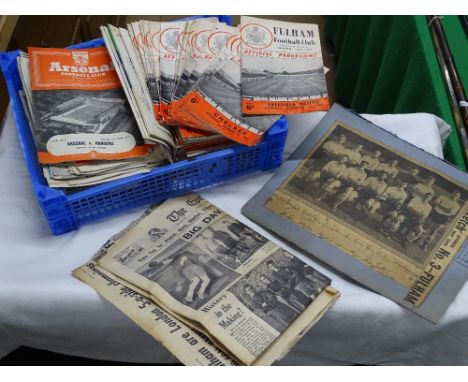 Fulham Football Club and Arsenal programmes, and a scrap book for Fulham circa 1950s.