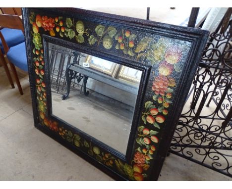 A square painted wall mirror decorated with fruit.