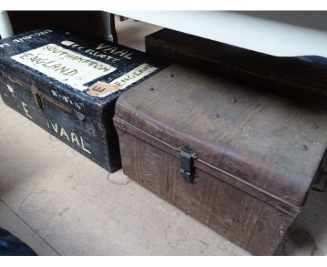 A Vintage metal trunk and another.