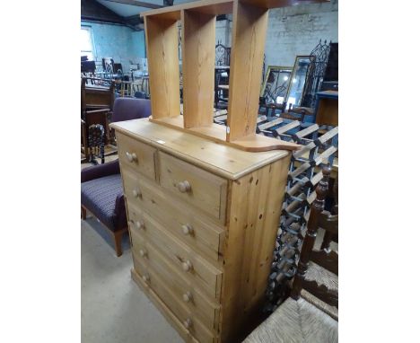 A modern polished pine 6-drawer chest, width 3', height 3'10" a hanging pine shelf and a swing toilet mirror.