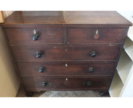 A Georgian Mahogany chest of two short and three long drawers on bracket feet