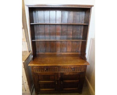 An Oak shelf back dresser