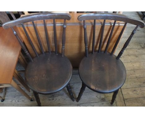 A modern drop leaf dining table, a pair of cane seated chairs, a pair of stick back chairs and a nest of four occasional tabl