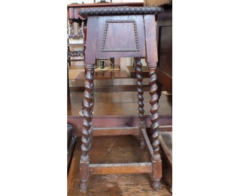 An Oak barley twist plant stand, a tin trunk, a radio cabinet and an Oak pedestal desk