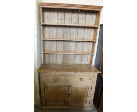 A Victorian Pine shelf back dresser